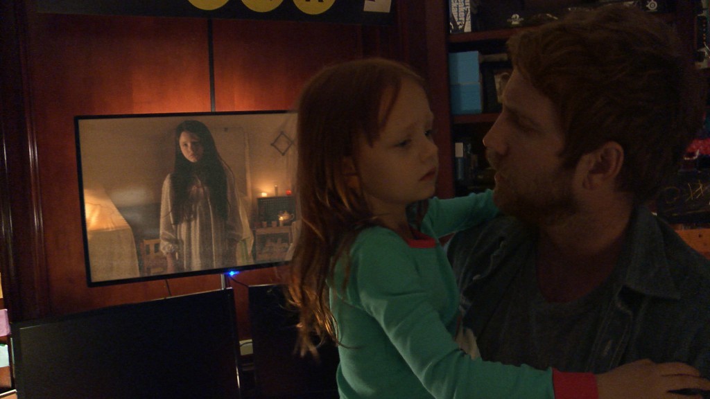 Left to right: Chloe Csengery plays Katie, Ivy George plays Leila, and Chris J. Murray plays Ryan in Paranormal Activity: The Ghost Dimension from Paramount Pictures.