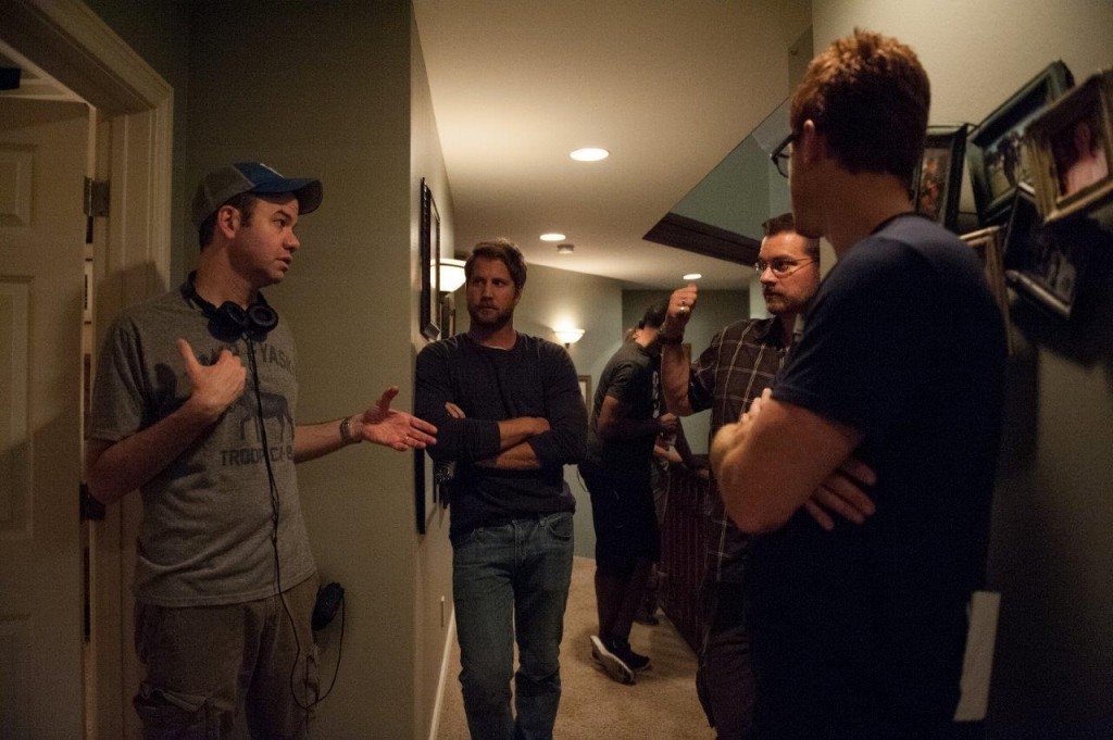 Left to right: Director Gregory Plotkin, Chris J. Murray, and Director of Photography John W. Rutland on the set of Paranormal Activity: The Ghost Dimension from Paramount Pictures.Photo credit: Suzanne Tenner © 2015 Paramount Pictures. All Rights Reserved.